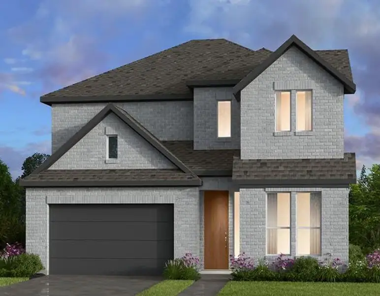 View of front of property featuring brick siding and driveway