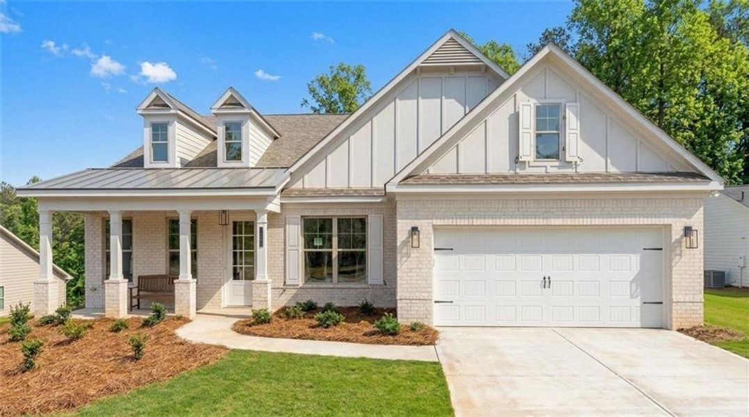 Front exterior of a new home in Soleil Belmont Park, Canton, GA, highlighting curb appeal (Image 1). Front exterior of a new home in Soleil Belmont Park, Canton, GA, highlighting curb appeal (Image 1).