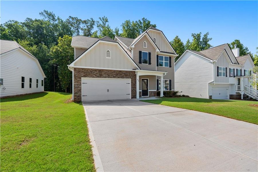Front exterior of a new home in , Villa Rica, GA, highlighting curb appeal (Image 19).