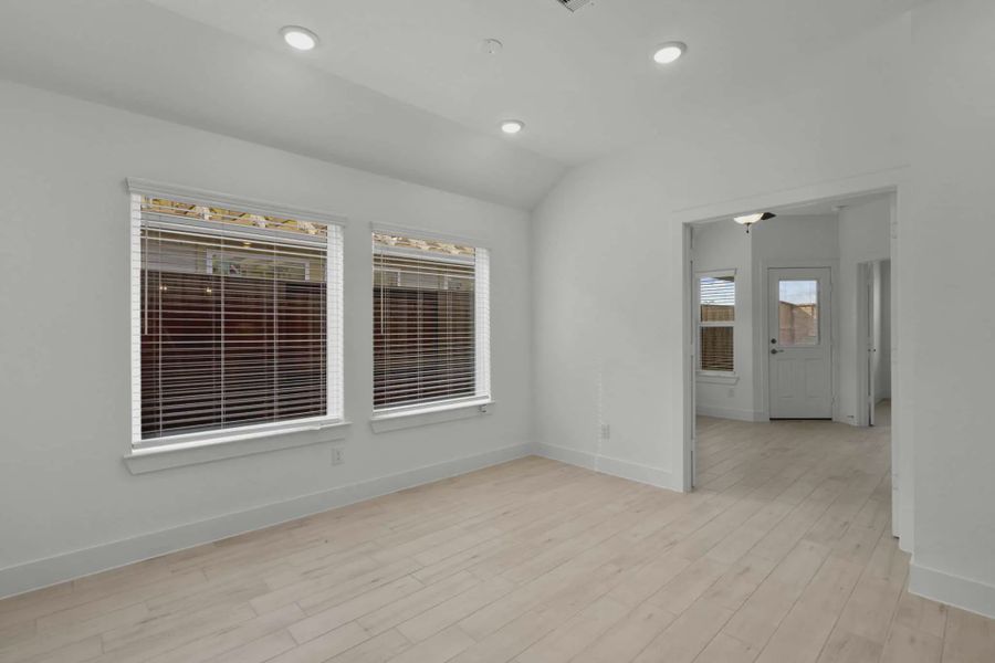Representative unfurnished interior of a home built from the Chalet by Chesmar Homes in Meridiana Townhomes, Iowa Colony (Image 21).