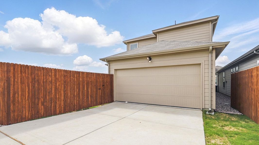 Representative exterior photo of a completed home built from the NUTMEG by D.R. Horton in Orchard Village, Fort Worth, TX (Image 20). Representative exterior photo of a completed home built from the NUTMEG by D.R. Horton in Orchard Village, Fort Worth, TX (Image 20).