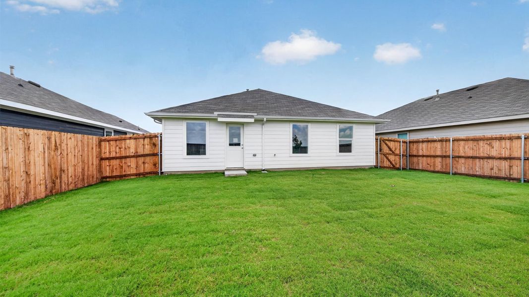 Exterior details and patio area of a home in Monarch at the Meadows, Ponder (Image 3).