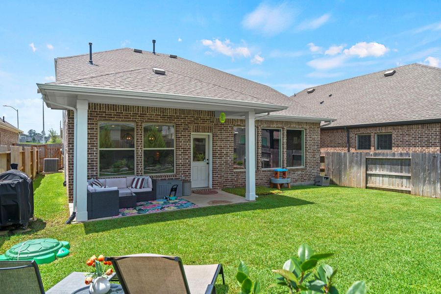 Exterior details and patio area of a home in , Magnolia (Image 3).