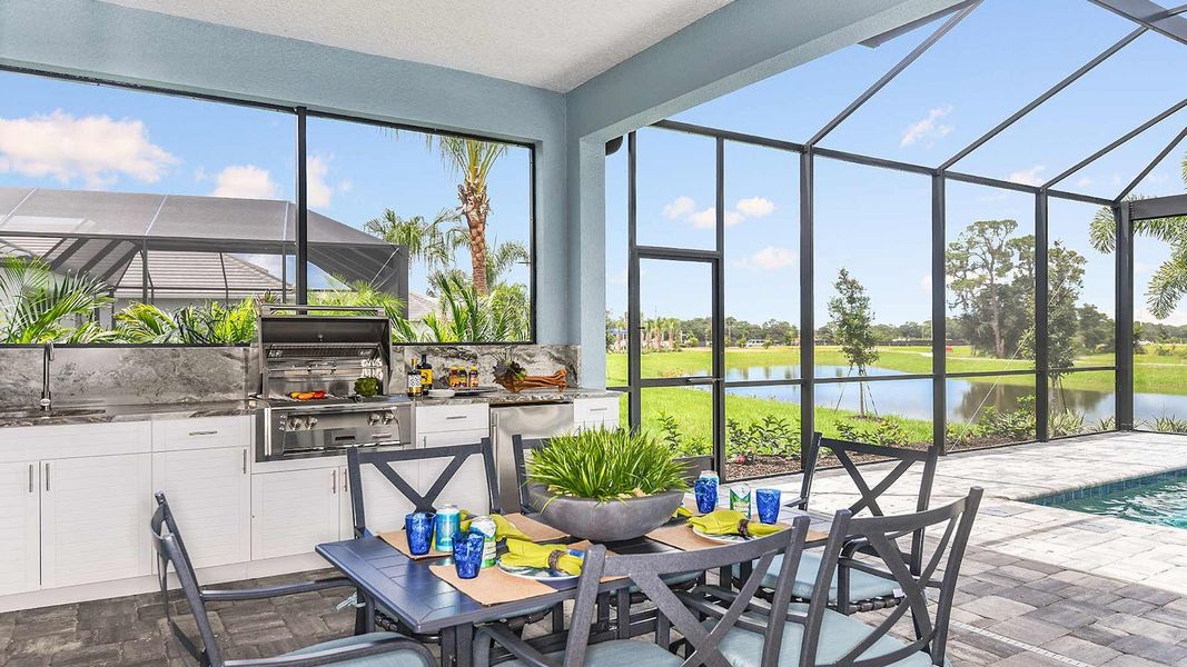 Exterior details and patio area of a home in SkySail Real Estate and Homes for Sale in Naples, FL - Neal Communities, Naples (Image 22).