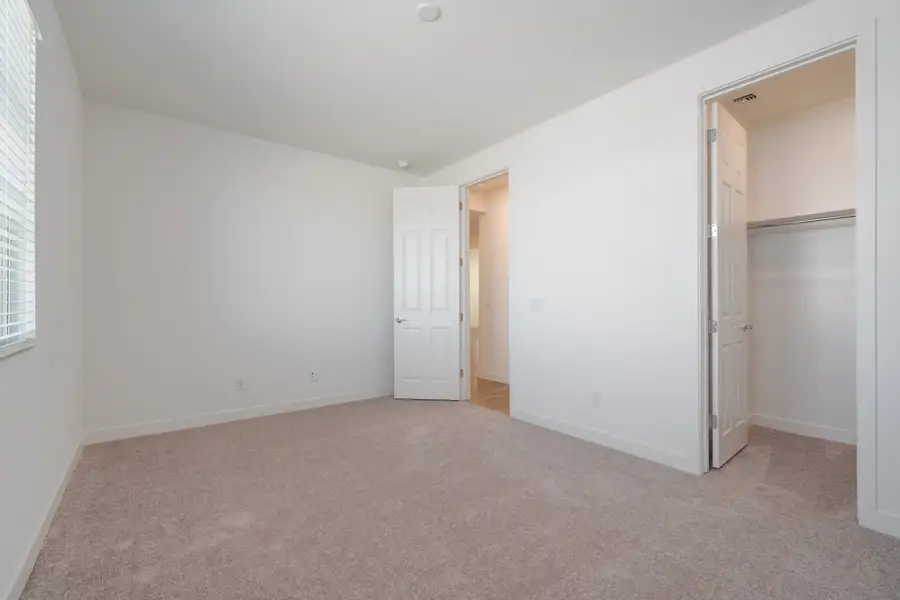 Spacious, unfurnished interior of a new home in Terraza, San Tan Valley (Image 14). Spacious, unfurnished interior of a new home in Terraza, San Tan Valley (Image 14).