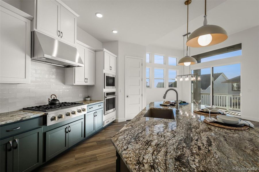 Furnished interior view inside a new home in Cloverleaf - Pinnacle Collection, Monument (Image 28).