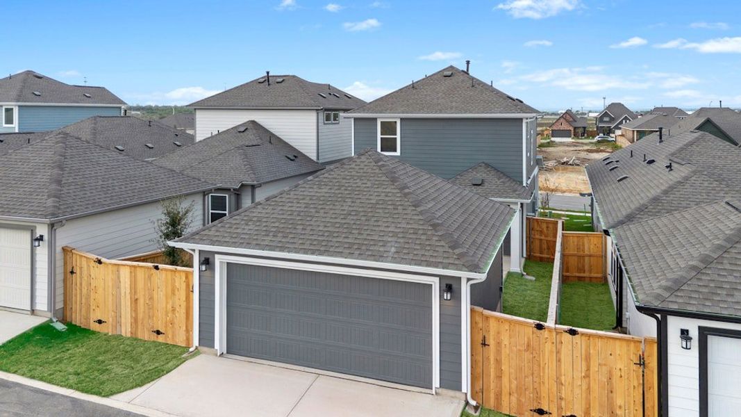 Front exterior of a new home in Mayfair, New Braunfels, TX, highlighting curb appeal (Image 19).