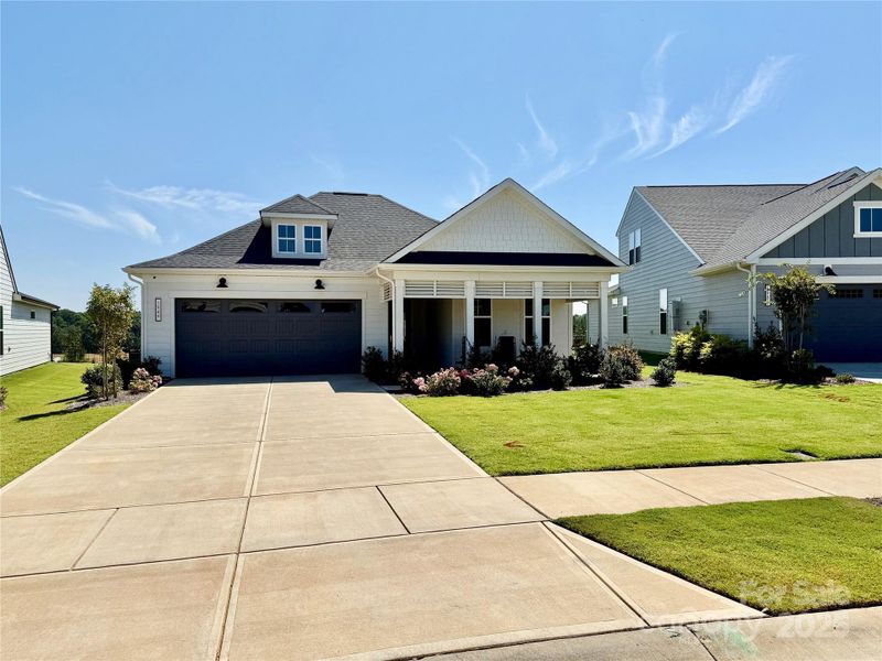 Front exterior of a new home in Carolina Riverside, Belmont, NC, highlighting curb appeal (Image 22).
