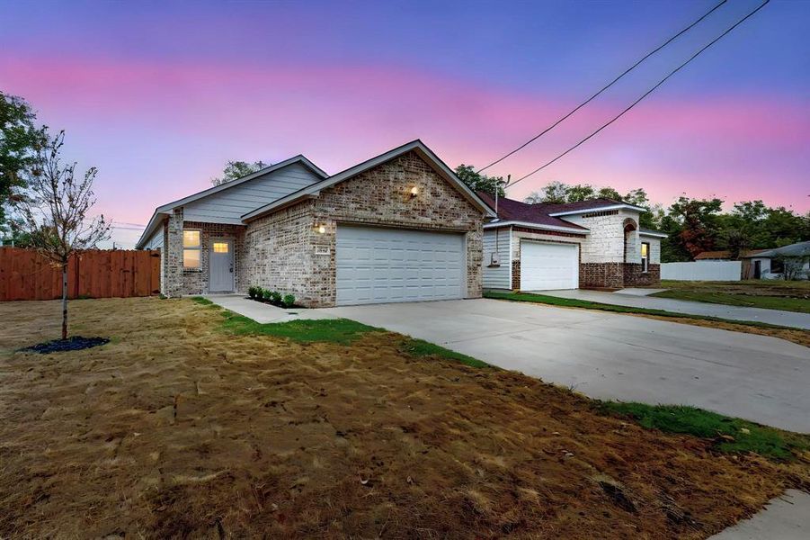 Single story home featuring a garage