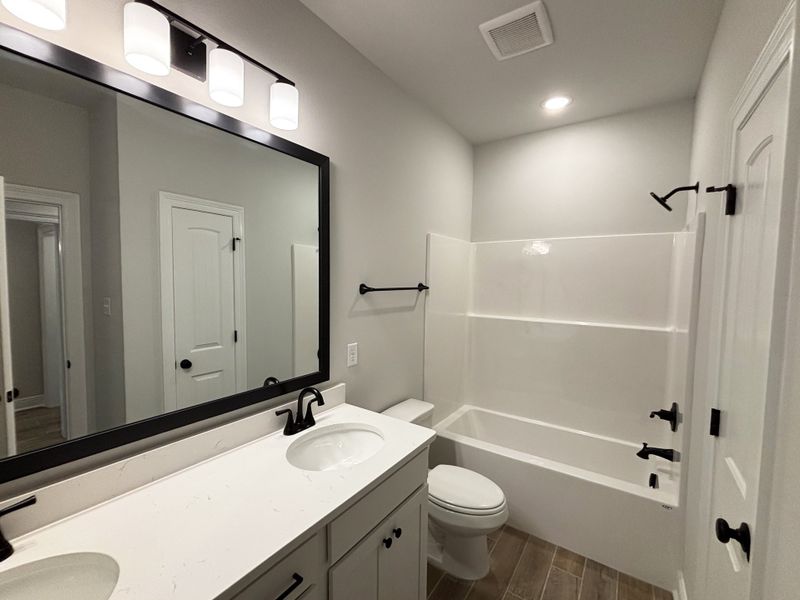 Furnished interior view inside a new home in Bird Song at Hammock Bay, Freeport (Image 10).