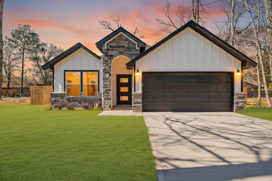 Front exterior of a new home in , Cleveland, TX, highlighting curb appeal (Image 20).