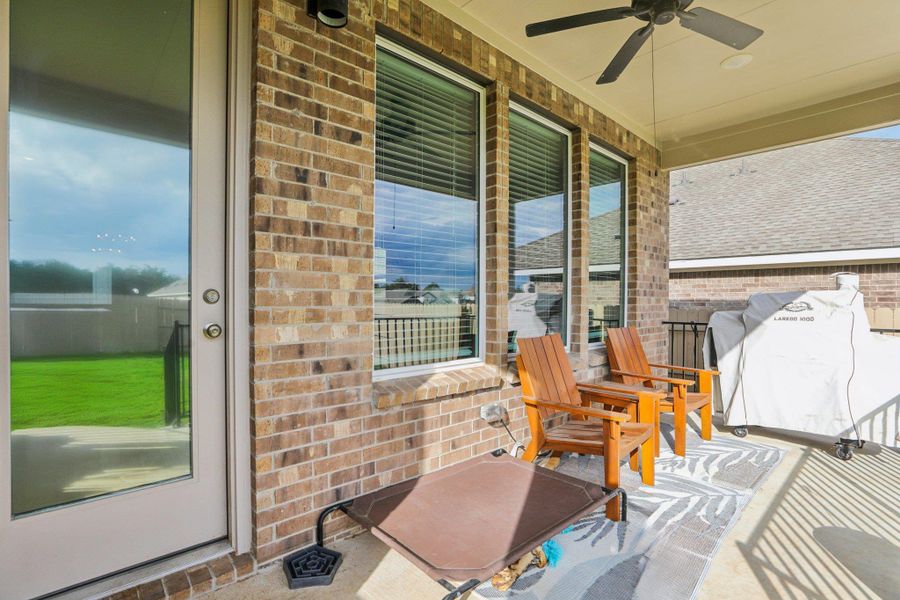 View of patio / terrace featuring ceiling fan and grilling area View of patio / terrace featuring ceiling fan and grilling area