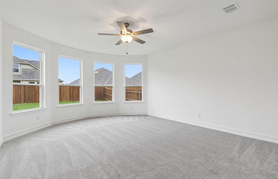 Elegant owner's suite with Bay window *real home pictured