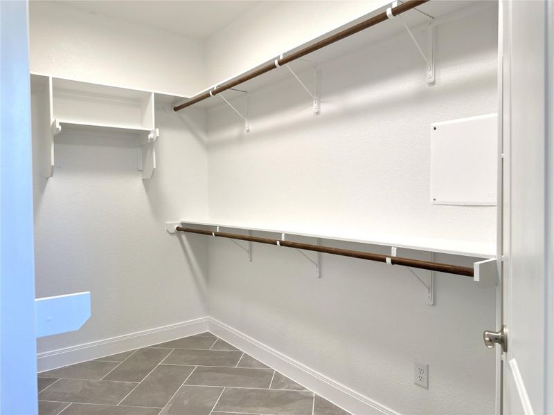 View of walk in closet View of walk in closet