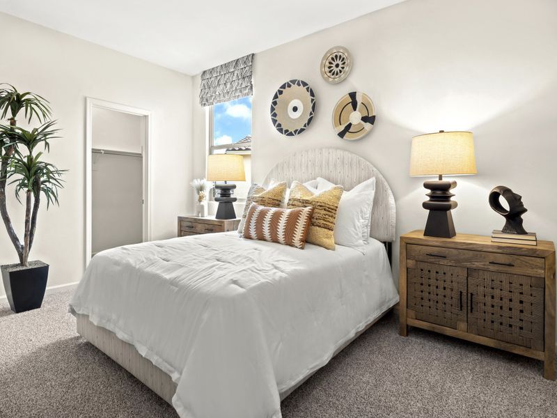 Spacious third bedroom with walk-in closet.