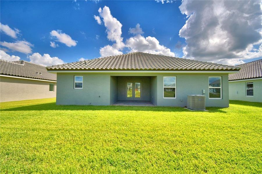 Exterior details and patio area of a home in , Auburndale (Image 30).