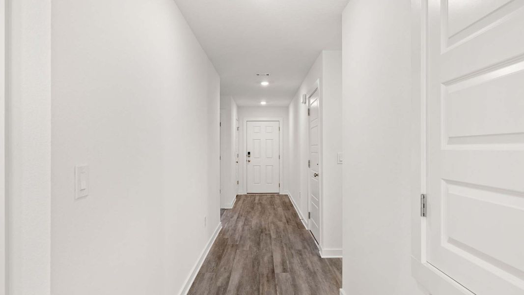 Spacious, unfurnished interior of a new home in Magnolia at the Bluffs Phase 3, Freeport (Image 10).