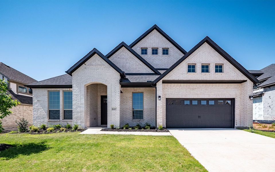 Representative exterior photo of a completed home built from the Atascadero by CastleRock Communities in Solterra, Mesquite, TX (Image 20).