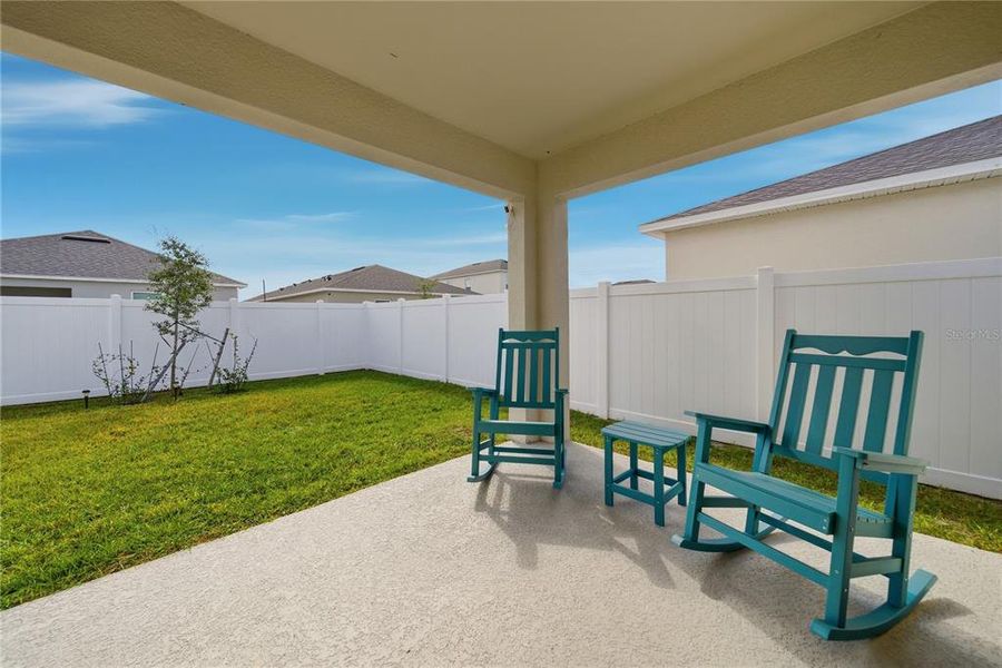 Exterior details and patio area of a home in , Harmony (Image 3). Exterior details and patio area of a home in , Harmony (Image 3).