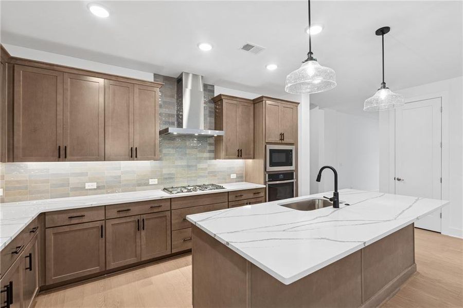 Furnished interior view inside a new home in Maple Grove at Towne Lake, Woodstock (Image 4).