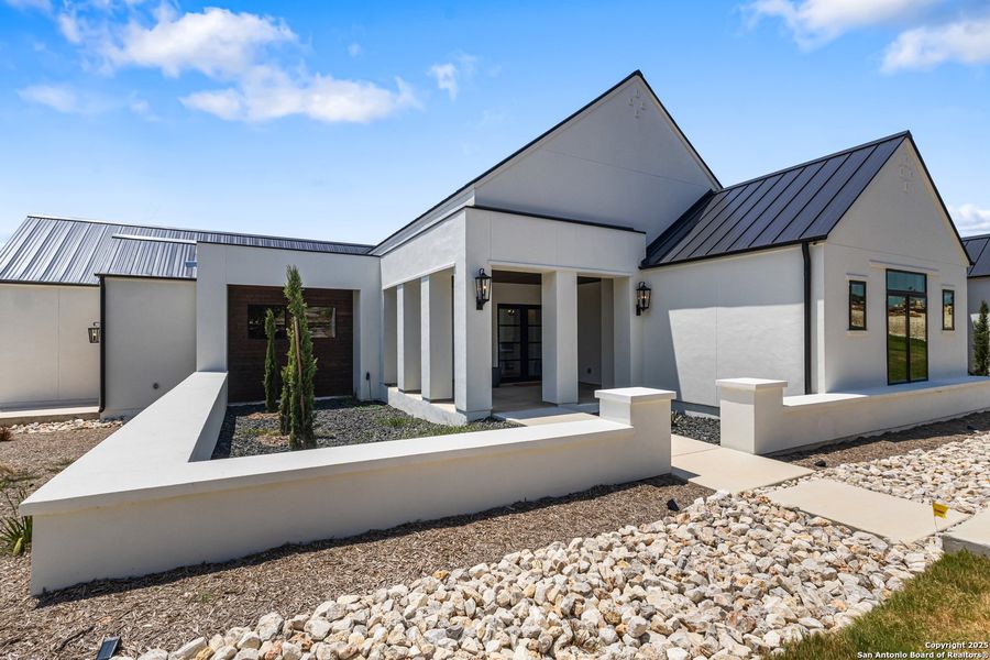 Front exterior of a new home in , San Antonio, TX, highlighting curb appeal (Image 29). Front exterior of a new home in , San Antonio, TX, highlighting curb appeal (Image 29).