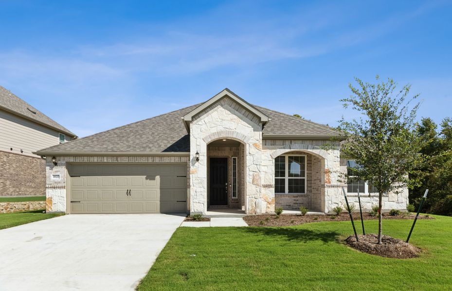 The Dunlay, a one-story home with 2-Car Garage, shown with Home Exterior D