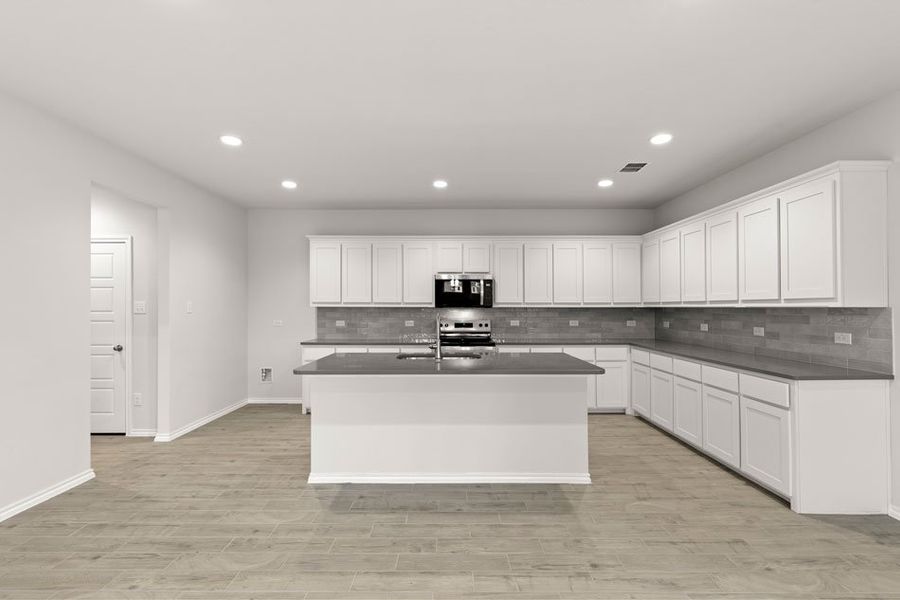 Representative exterior photo of a completed home built from the Phoenix by Impression Homes in Keeneland, Aubrey, TX (Image 4). Representative exterior photo of a completed home built from the Phoenix by Impression Homes in Keeneland, Aubrey, TX (Image 4).