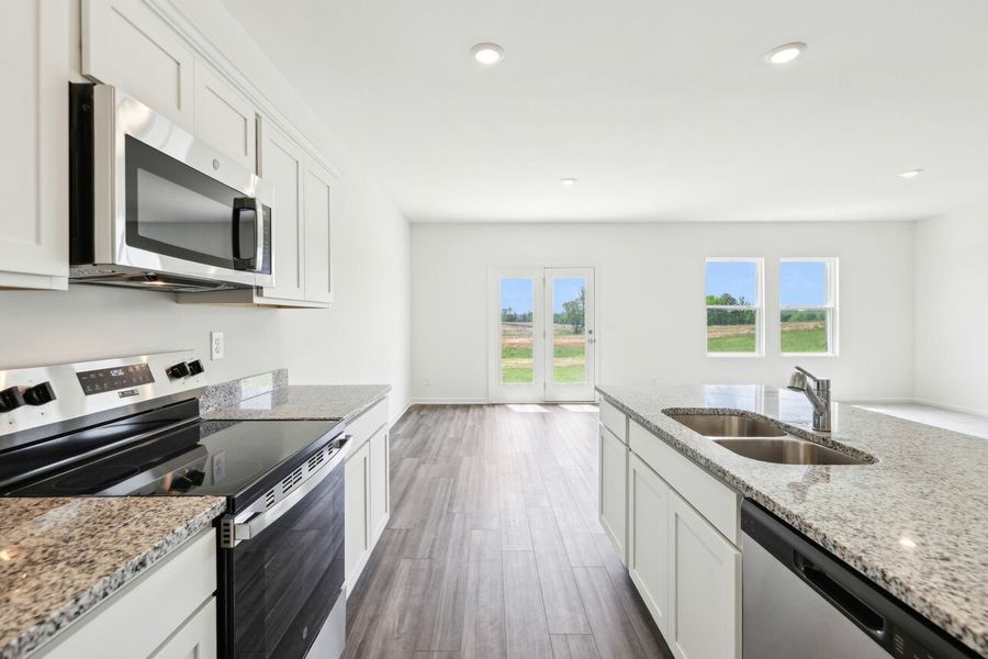 Representative furnished interior of a home built from the Galileo by Starlight Homes in Harrington Trails at The Canopies, New Caney (Image 27).