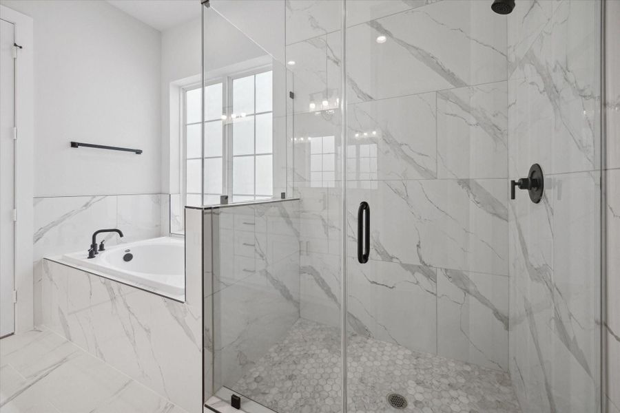 Primary bathroom soaking tub and shower