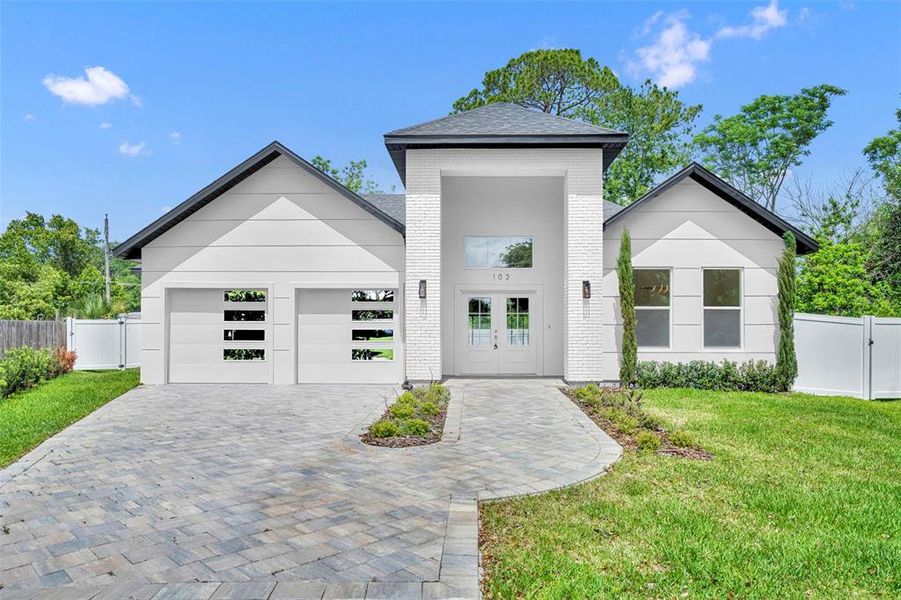 Front exterior of a new home in , Winter Park, FL, highlighting curb appeal (Image 2). Front exterior of a new home in , Winter Park, FL, highlighting curb appeal (Image 2).