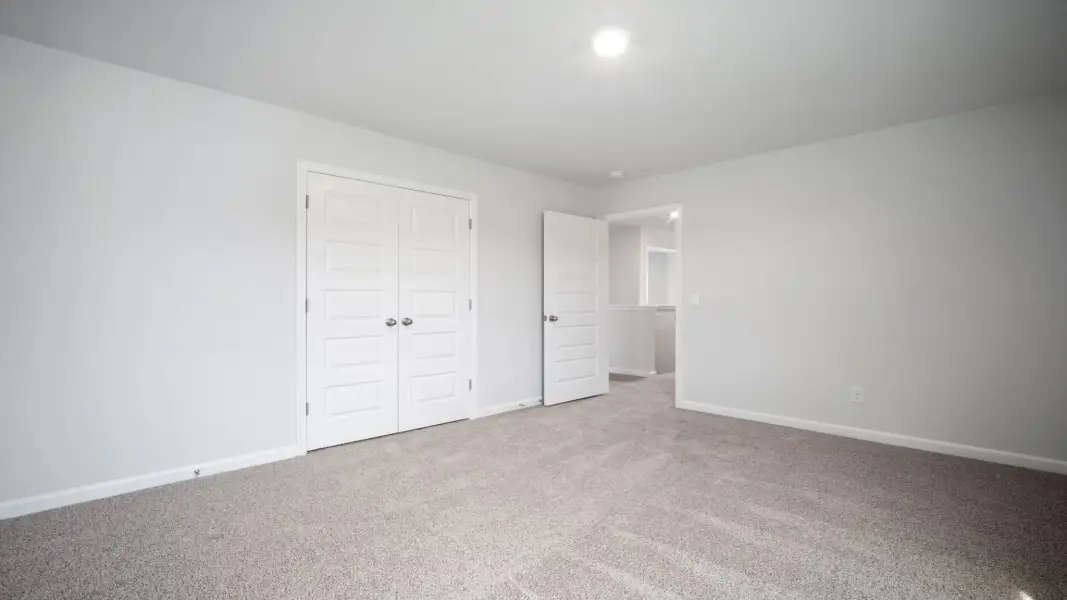 Spacious, unfurnished interior of a new home in The Retreat at East Argent, Ridgeland (Image 31).
