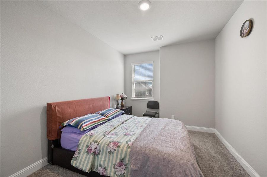 Furnished interior view inside a new home in Dove Creek, Midlothian (Image 34).