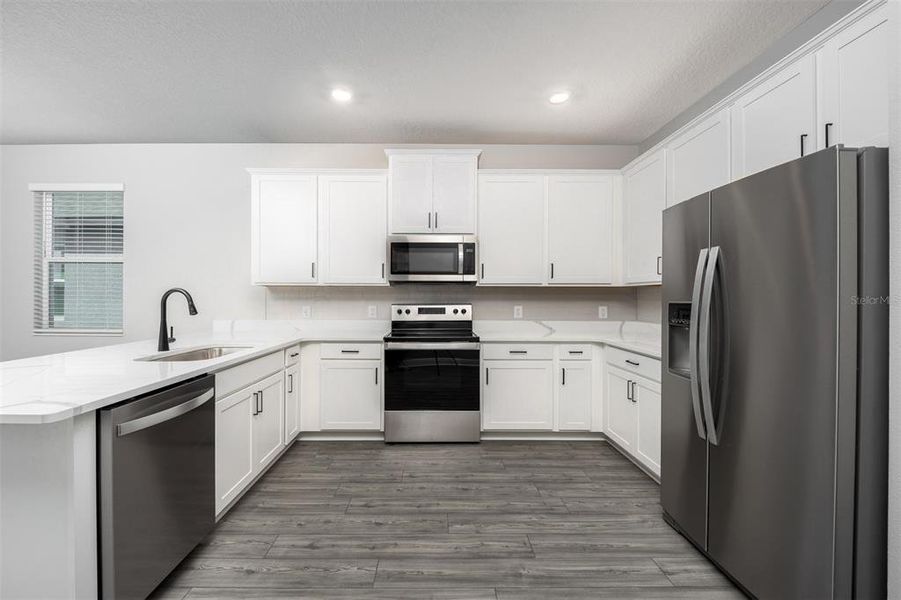 Furnished interior view inside a new home in Gum Lake Preserve, Lake Alfred (Image 6).
