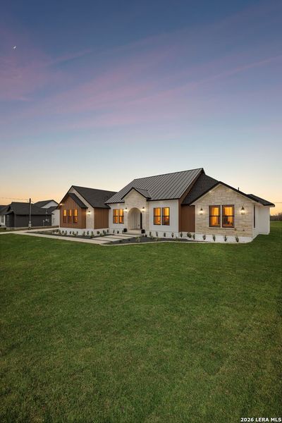 Exterior details and patio area of a home in , Floresville (Image 24).