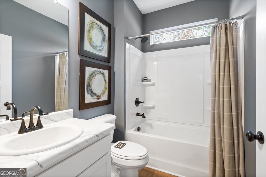 Furnished interior view inside a new home in Maddox Station, Eatonton (Image 9).