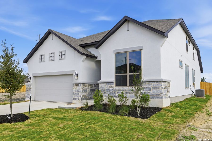 Front exterior of a new home in Haby Hill 50s, San Antonio, TX, highlighting curb appeal (Image 20).