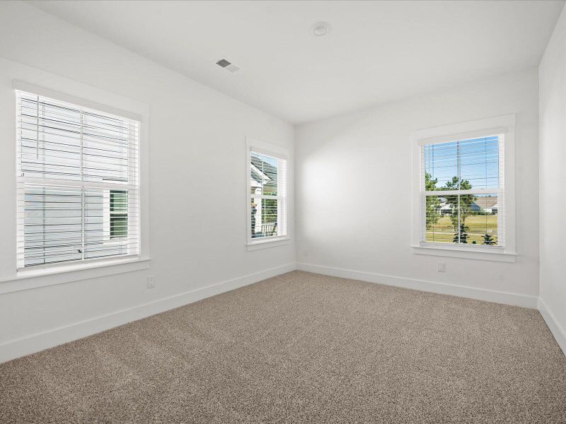 Spacious, unfurnished interior of a new home in The Coves at Lakes of Cane Bay, Summerville (Image 21). Spacious, unfurnished interior of a new home in The Coves at Lakes of Cane Bay, Summerville (Image 21).