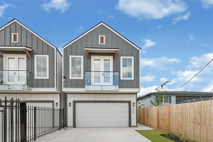 Front entrance with a Juliet balcony and a convenient 2-car garage.