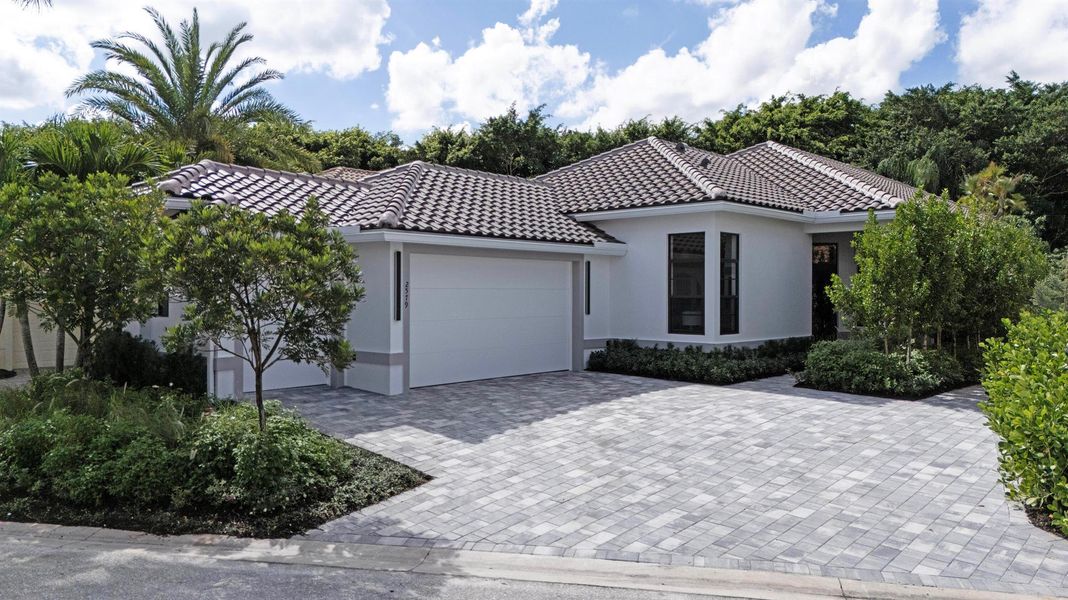 Front exterior of a new home in , Wellington, FL, highlighting curb appeal (Image 2).