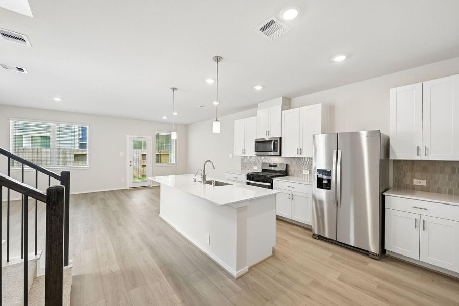 Furnished interior view inside a new home in Kemah Crossing - City Series, Kemah (Image 7).