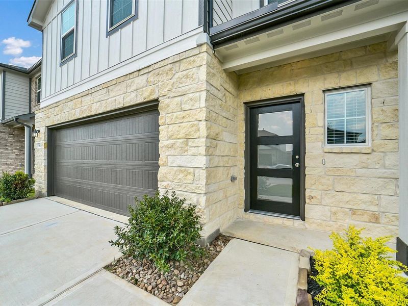 Exterior details and patio area of a home in Lakes at Black Oak, Magnolia (Image 21). Exterior details and patio area of a home in Lakes at Black Oak, Magnolia (Image 21).