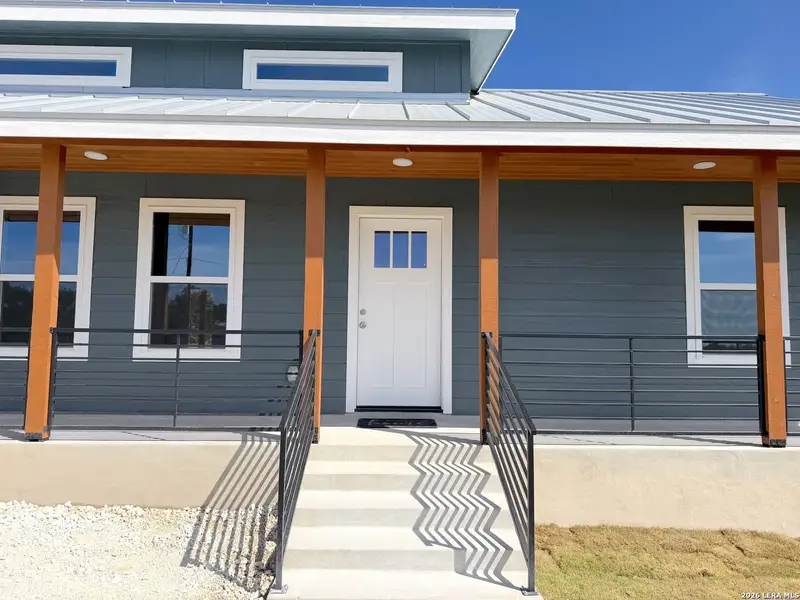 Exterior details and patio area of a home in , Spring Branch (Image 4).