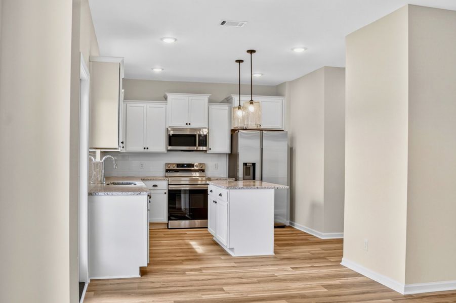 Representative furnished interior of a home built from the The Sunbury by RTS Homes in Doctor's Creek, Ludowici (Image 7).
