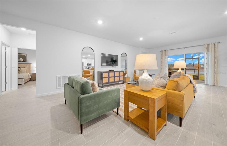 Furnished interior view inside a new home in Pioneer Ranch: Pioneer Ranch 60's, Ocala (Image 23).