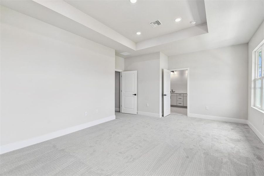 Spacious, unfurnished interior of a new home in Emerald Landing at Waterside at Lakewood Ranch – Cottage Series, Sarasota (Image 17).