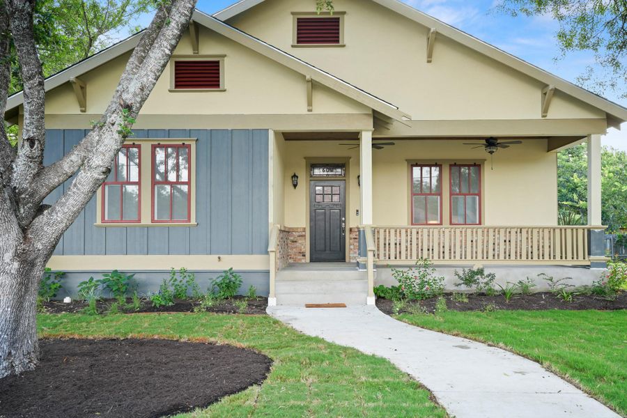 A welcoming facade, blending siding and brick accents with a generous front porch and landscaped grounds. A welcoming facade, blending siding and brick accents with a generous front porch and landscaped grounds.