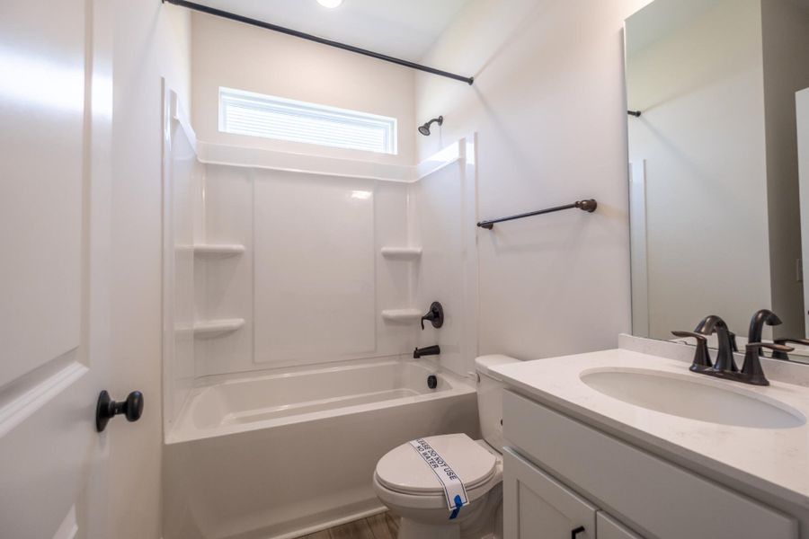 Furnished interior view inside a new home in Cottages at Piper Village, Trinity (Image 10). Furnished interior view inside a new home in Cottages at Piper Village, Trinity (Image 10).