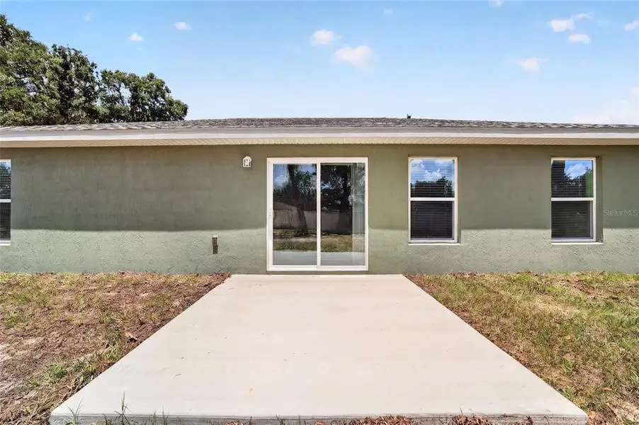 Exterior details and patio area of a home in , Ocala (Image 20).