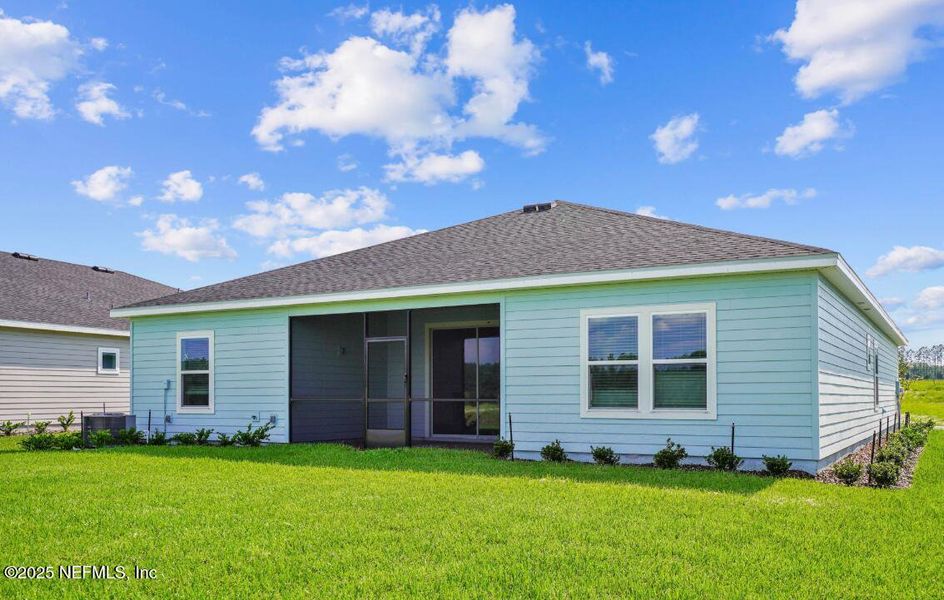 Front exterior of a new home in Edenbrooke at Hyland Trail | 55+: Edenbrooke at Hyland Trail 60s, Green Cove Springs, FL, highlighting curb appeal (Image 1).