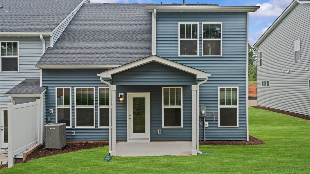 Front exterior of a new home in Aspen Ridge, Lyman, SC, highlighting curb appeal (Image 18). Front exterior of a new home in Aspen Ridge, Lyman, SC, highlighting curb appeal (Image 18).